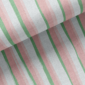 Beside the Seaside linen by Annika Reed in pink and green, draped, showing seaside stripes