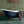 Plume wallpaper by Tatie Lou in teal, Deco plumes in a bathroom