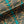 Plume velvet by Tatie Lou in teal, in soft folds showing Deco plumes