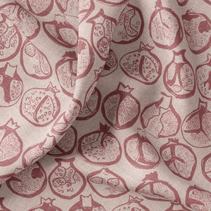Pomegranate linen by Annika Reed in pink, draped, showing pomegranates