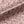Pomegranate linen by Annika Reed in pink, in soft folds showing pomegranates