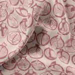 Pomegranate velvet by Annika Reed in pink, draped close-up of pomegranates