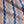 Pool Party linen by Bethie Tricks in blue and orange, draped, showing painted pool stripes