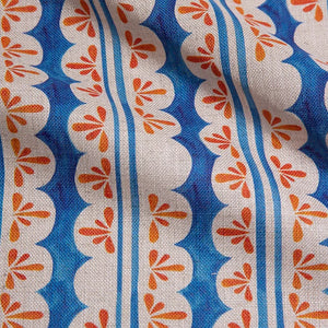 Pool Party linen by Bethie Tricks in blue and orange, draped, showing painted pool stripes