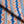 Pool Party linen by Bethie Tricks in blue and orange, in soft folds showing painted pool stripes