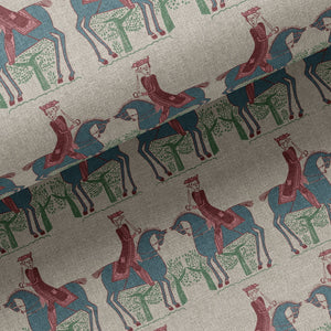 Red Coat linen by Annika Reed in cream and teal, draped, showing riders on horseback
