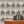 Red Coat wallpaper by Annika Reed in teal and red, riders on horseback above a sideboard