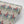 Red Coat wallpaper by Annika Reed in teal and red, roll showing riders on horseback