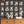Resisting Arrest wallpaper by Brand McKenzie in black, detail of animal mugshot portraits