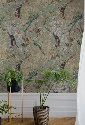 Resplendent Woods superwide wallpaper by Deus ex Gardenia in sage green in a styled room setting