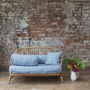 Riad linen by Bethie Tricks in blue, a tile pattern in a living room
