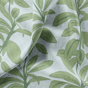Rubber Plant velvet by Annika Reed in sage green, draped, showing rubber plant leaves