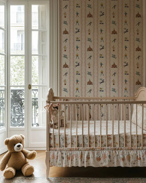Run Away to the Circus wallpaper by Annika Reed in cream, circus performers and tents in a child's room