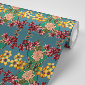 Hampi wallpaper by Tatie Lou in green, sample roll showing tropical flowers in a mirrored print