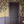 Seasons of the Vine wallpaper by Dami and Em Design in beige, grape vines in an entryway