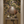 Seasons of the Vine wallpaper by Dami and Em Design in beige, grape vines above a sideboard