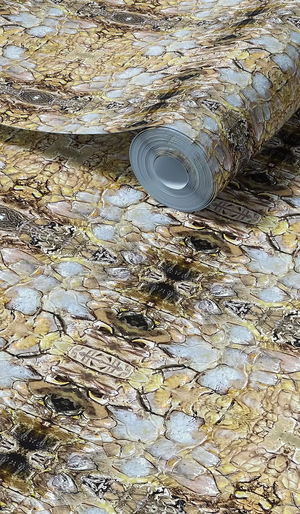 Shell wallpaper by Dami and Em Design in gold, roll showing shell motifs