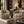 Shell velvet by Dami and Em Design in gold, shell motifs upholstered on an armchair