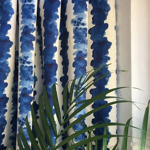 Small Waves Ink linen by Bethie Tricks in blue, inky wave stripes made into curtains