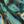 Soltar velvet by Tatie Lou in teal, draped, showing a Deco arch pattern