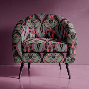 Soltar velvet by Tatie Lou in pink, a Deco arch pattern upholstered on an armchair