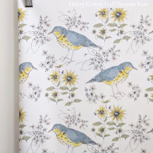 Song Thrush and Flora fabric by Seed Home Designs in blue and yellow, flat sample of song thrushes and flowers