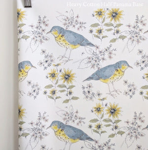 Song Thrush and Flora fabric by Seed Home Designs in blue and yellow, flat sample of song thrushes and flowers