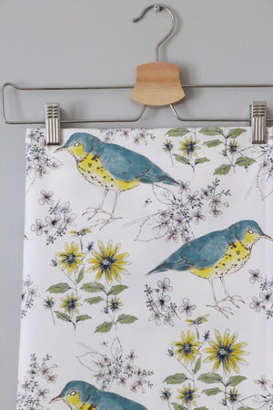Song Thrush and Flora fabric by Seed Home Designs in blue and yellow, pattern sample of song thrushes and flowers