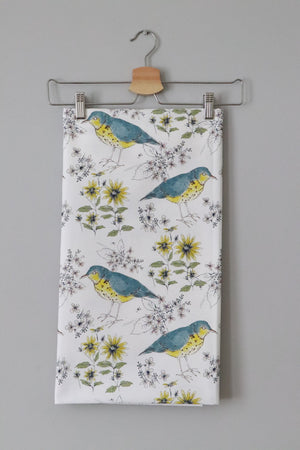 Song Thrush and Flora fabric by Seed Home Designs in blue and yellow, full repeat of song thrushes and flowers