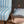 Double Scroll Stripe linen by Parker and Jules in blue, wavy scroll stripes upholstered on an armchair
