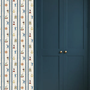 Stow Away With the Sailors wallpaper by Annika Reed in blue and red, sailors and boats in a hallway