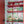 Strawberry Fields wallpaper by Parker and Jules in green, strawberries, ferns and pansies in a kitchen