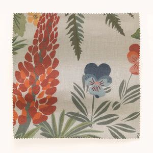 Strawberry Fields linen by Parker and Jules in olive, in soft folds showing strawberries, ferns and pansies