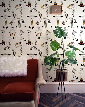 Strong Man wallpaper by Dupenny in multicolour, circus strongmen on a living room wall