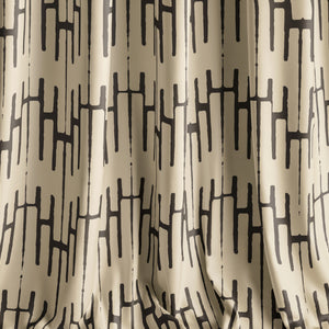 Structured Chaos velvet by Dami and Em Design in cream, a geometric design made into curtains