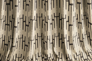 Structured Chaos velvet by Dami and Em Design in cream, a geometric design made into curtains