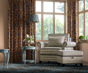 Structured Chaos velvet by Dami and Em Design in brown, a geometric design in a living room