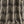 Structured Chaos velvet by Dami and Em Design in brown, a geometric design as lined curtains