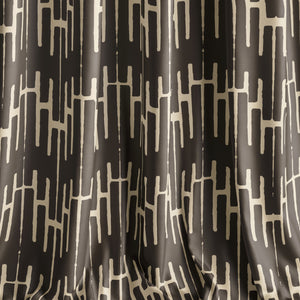 Structured Chaos velvet by Dami and Em Design in brown, a geometric design as lined curtains