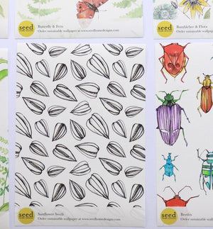 Sunflower Seed wallpaper by Seed Home Designs in black, flat sample of sunflower seeds
