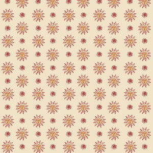 Sunshine Masquerade linen by Annika Reed in cream and red, full repeat of sun and mask motifs