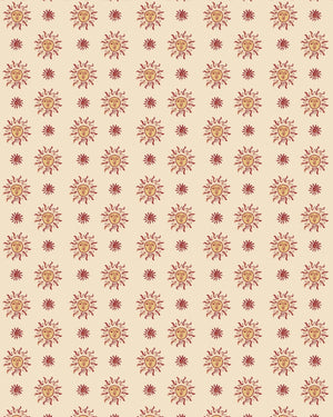 Sunshine Masquerade linen by Annika Reed in cream and red, full repeat of sun and mask motifs