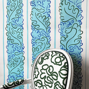 Sweet Memory wallpaper by Claire de Quénetain in blue and green, a hand-painted floral design in a styled room setting