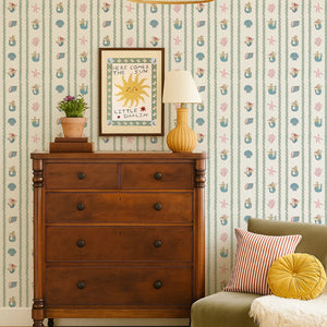 Swim Away With the Mermaids wallpaper by Annika Reed in cream and pink, shells and mermaids in a bedroom