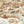 Tally Ho! wallpaper by Brand McKenzie in beige, close-up of a countryside landscape