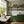 Tetris wallpaper by Annika Reed in green, tiny sprigs in a grid in a kitchen