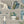 The Cabinet wallpaper by Brand McKenzie in beige, pattern detail of a cabinet of curiosities
