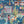 The Glitter Ranch wallpaper by Brand McKenzie in navy, close-up of a desert ranch scene