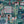 The Glitter Ranch wallpaper by Brand McKenzie in navy, close view of a desert ranch scene
