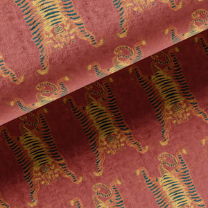 Tibetan Tiger velvet by Annika Reed in red and orange, in soft folds showing Tibetan tigers